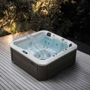 VIVO SPA WELUXIA 514 N Whirlpool mit dunkler Holzoptik-Verkleidung auf einer Gartenterrasse